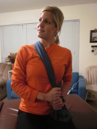 First Rib Mobilization: Patient seated. Thin sheet strap positioned around first rib. Pull strap towards opposite hip. Neck retracted, contralateral lateral flexion, and ipsilateral rotation. Ipsilateral head rotation emphasizes scalene stretch. Contralateral rotation emphasizes rib mobilization.