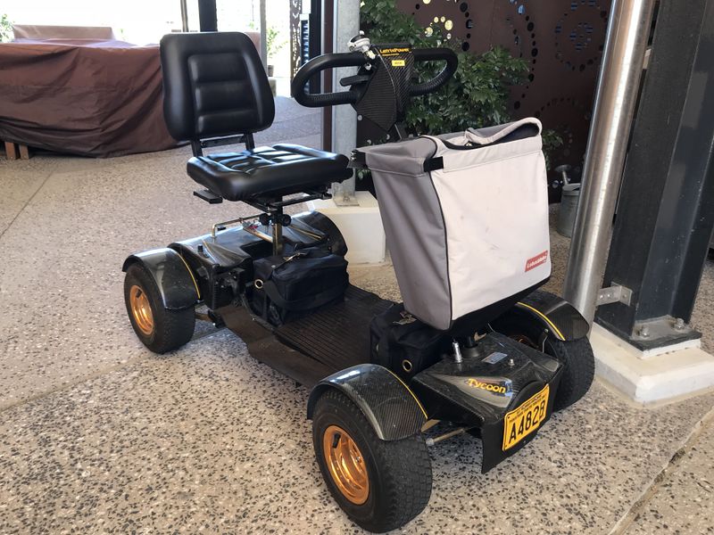 File:Motorised wheelchair (mobility scooter) in Australia 02.jpg
